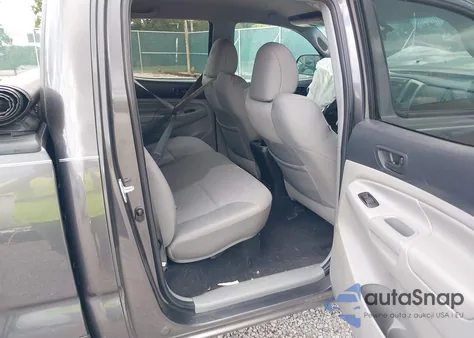 2013 Toyota Tacoma Base V6 z USA, uszkodzony, nr VIN 5TFMU4FN7DX011977